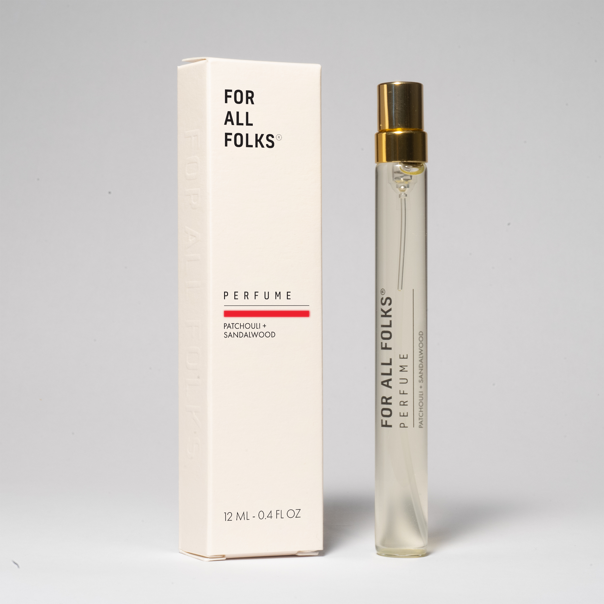 Perfume For All Folks Patchouli + Sandwalwood. 12ml bottle and packaging.
